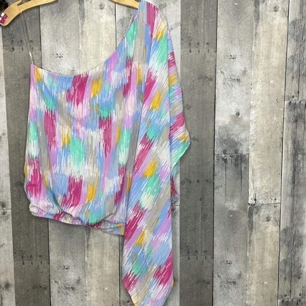 Nwt Caramela multicolored one shoulder blouse.  Pink, blue, purple, yellow, grey